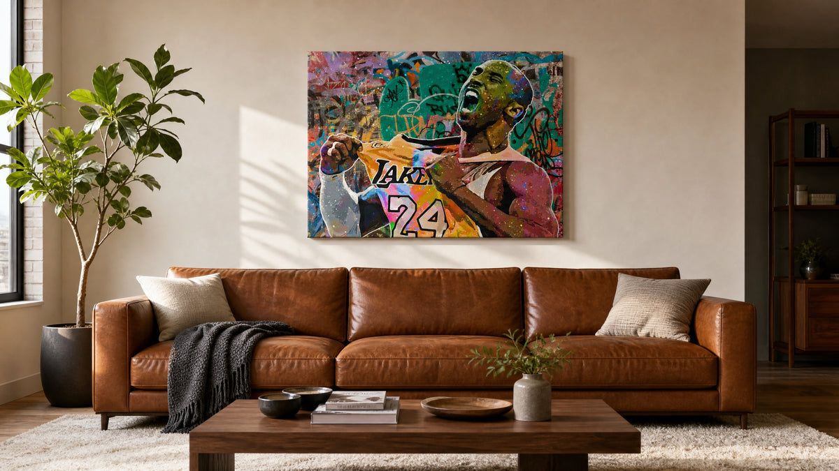 Black Mamba sports wall art canvas hanging above a cognac leather sofa in a modern living room